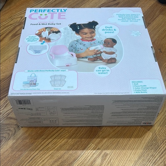 Perfectly Cute Brown Baby Doll Set with bottle toilet & color change diaper new - Picture 3 of 6